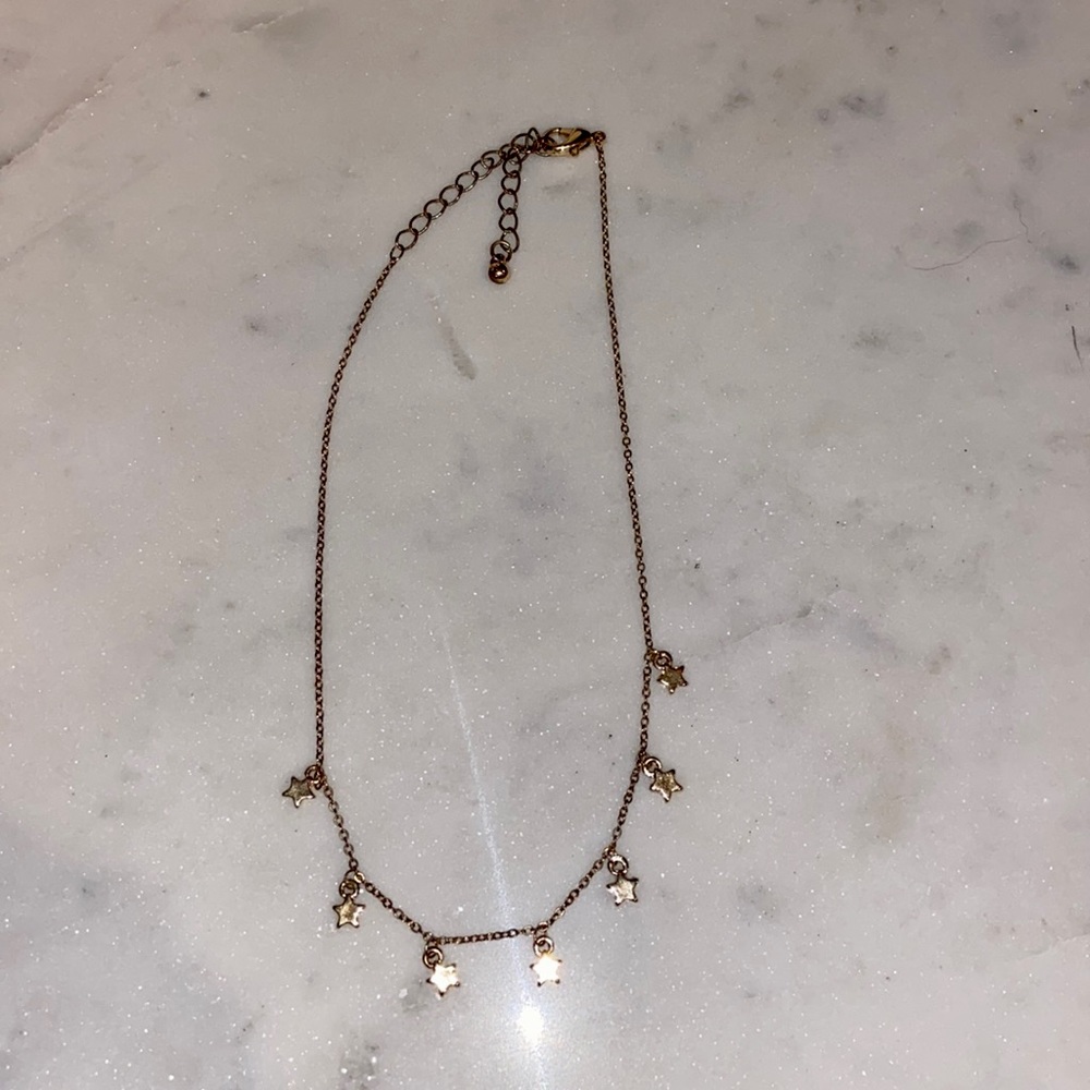 Gold star necklace! In perfect condition!